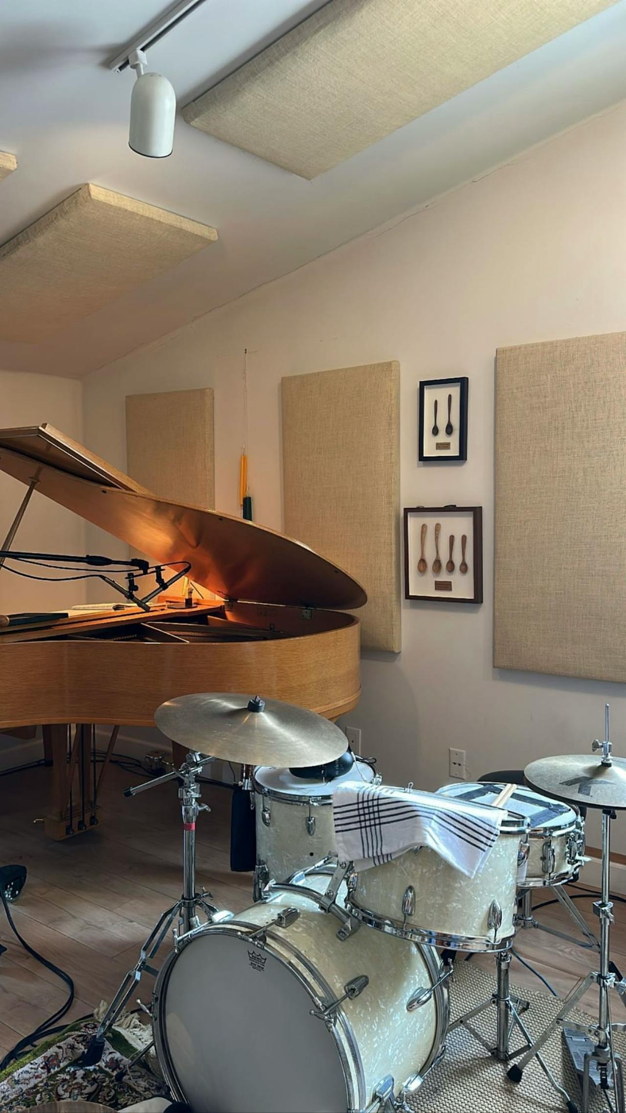 image of medium room with a piano